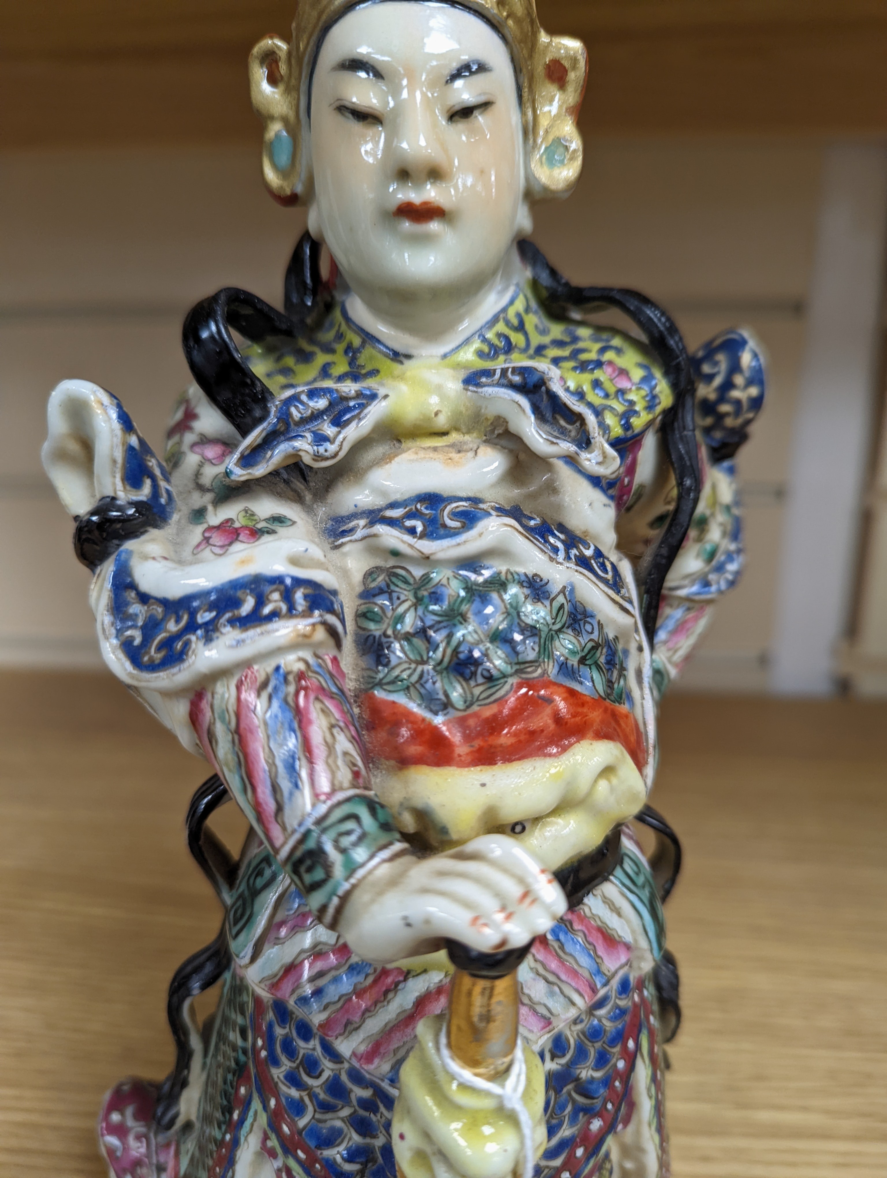 A Chinese enamelled porcelain figure of a General, Republic period, 26cm